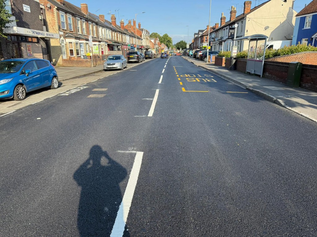 Two-way street with centre lining and bus stop bay markings